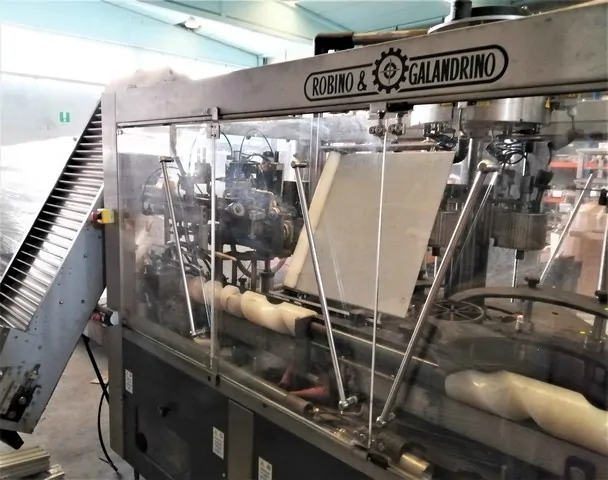 Used Bottling PVC Capsuling Machine Robino & Galandrino - 2004, 6,000 BPH