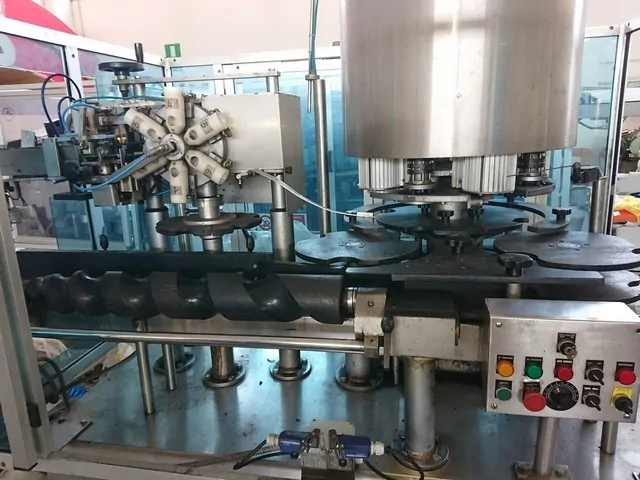 Used Bottling PVC Capsuling Machine Nortan - 1999, 6,000 BPH