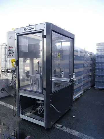 Used Bottling Polylaminate Capsuling Machine Nortan - 2002, 4,000 BPH