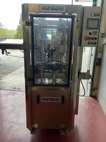 Used Bottling PVC Capsuling Machine Nortan - 2010, 3,000 BPH