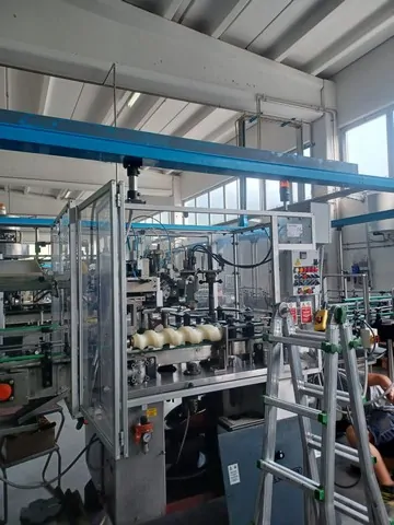 Used Bottling PVC Capsuling Machine Robino & Galandrino M. FENIX 2 - 1998, 4,000 BPH