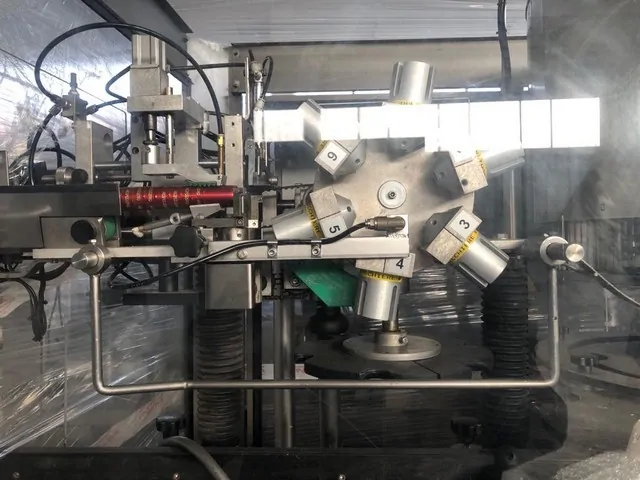 Used Bottling PVC Capsuling Machine Nortan PRISMA 4.4 R.T - 2001, 5,000 BPH