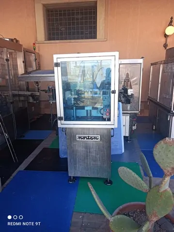 Used Bottling PVC Capsuling Machine Nortan - 1993, 3,000 BPH