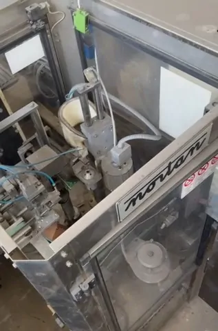 Used Bottling PVC Capsuling Machine Nortan - 2,500 BPH