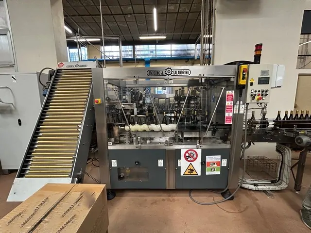 Used Bottling Polylaminate Capsuling Machine Robino & Galandrino Astra F 6 - 2002, 7,000 BPH