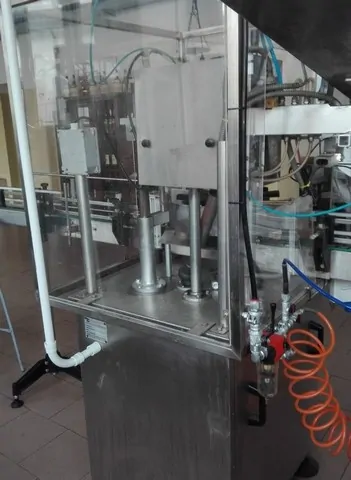 Used Bottling PVC Capsuling Machine Nortan - 1999, 2,500 BPH