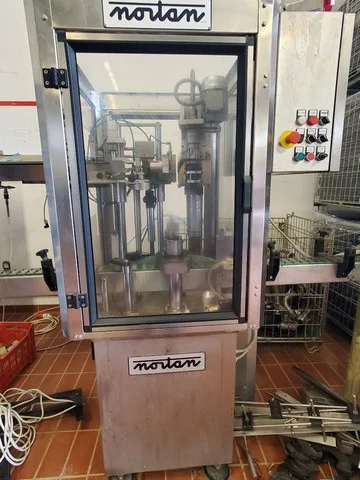 Used Bottling Polylaminate Capsuling Machine Nortan UNICAP 35 - 1999, 750 BPH