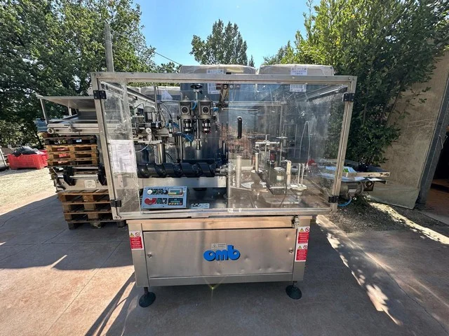 Used Bottling Self-Adhesive Capsuling Machine OMB ET 2000 2T - 1999, 1,800 BPH