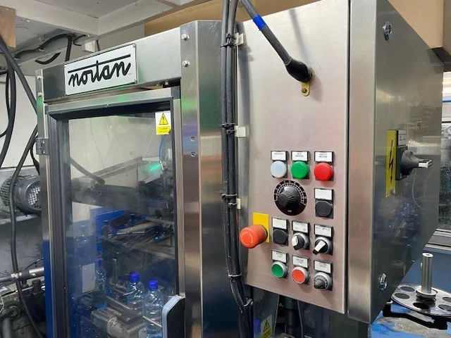 Used Bottling PVC Capsuling Machine Nortan UNICAP 35 T - 2005, 3,000 BPH