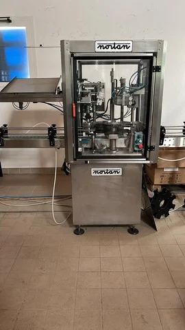 Used Bottling Champagne Capsuling Machine Nortan UNICAP 35 S - 1998, 2,500 BPH