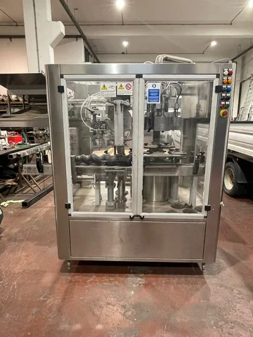 Used Bottling PVC Capsuling Machine Omar capsuling machine - 1999, 6,500 BPH