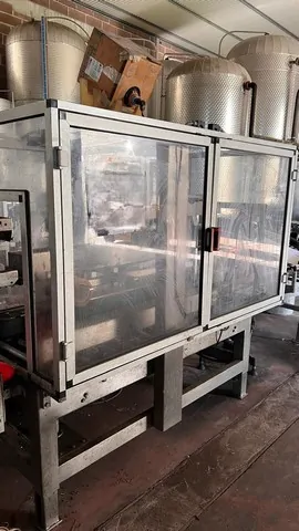 Used Bottling Case Packer TMG - 1991, 2,500 BPH