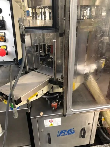 Used Bottling Self-Adhesive Labeler P.E. - 2003, 9,000 BPH | Stock EA 450