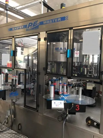 Used Bottling Self-Adhesive Labeler P.E. - 2003, 9,000 BPH