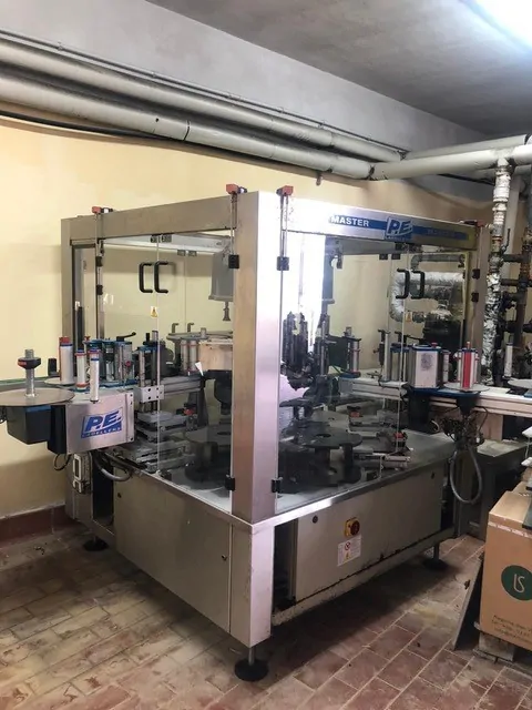 Used Bottling Self-Adhesive Labeler P.E. MASTER M - 2004, 6,000 BPH