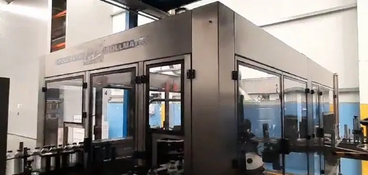 Used Bottling Roll-Fed Labeler P.E. ROLLMATIC N - 2007, 30,000 BPH