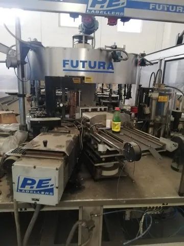 Used Bottling Hot Glue Labeler P.E. FUTURA S - 2002, 25,000 BPH