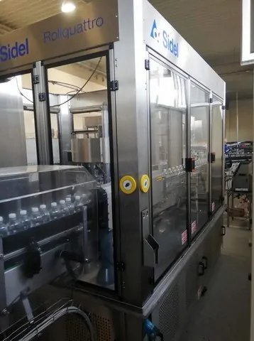 Used Bottling Roll-Fed Labeler Sidel Rollquattro F15 - 2015, 25,000 BPH