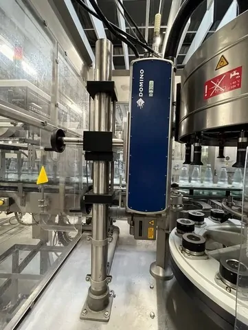 Used Bottling Hot Glue Labeler Krones Canmatic 720-12 - 2011, 18,000 BPH