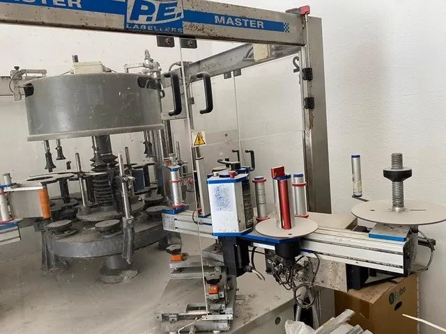 Used Bottling Self-Adhesive Labeler P.E. MASTER M 6T 540 2S 2E - 2004, 3,000 BPH
