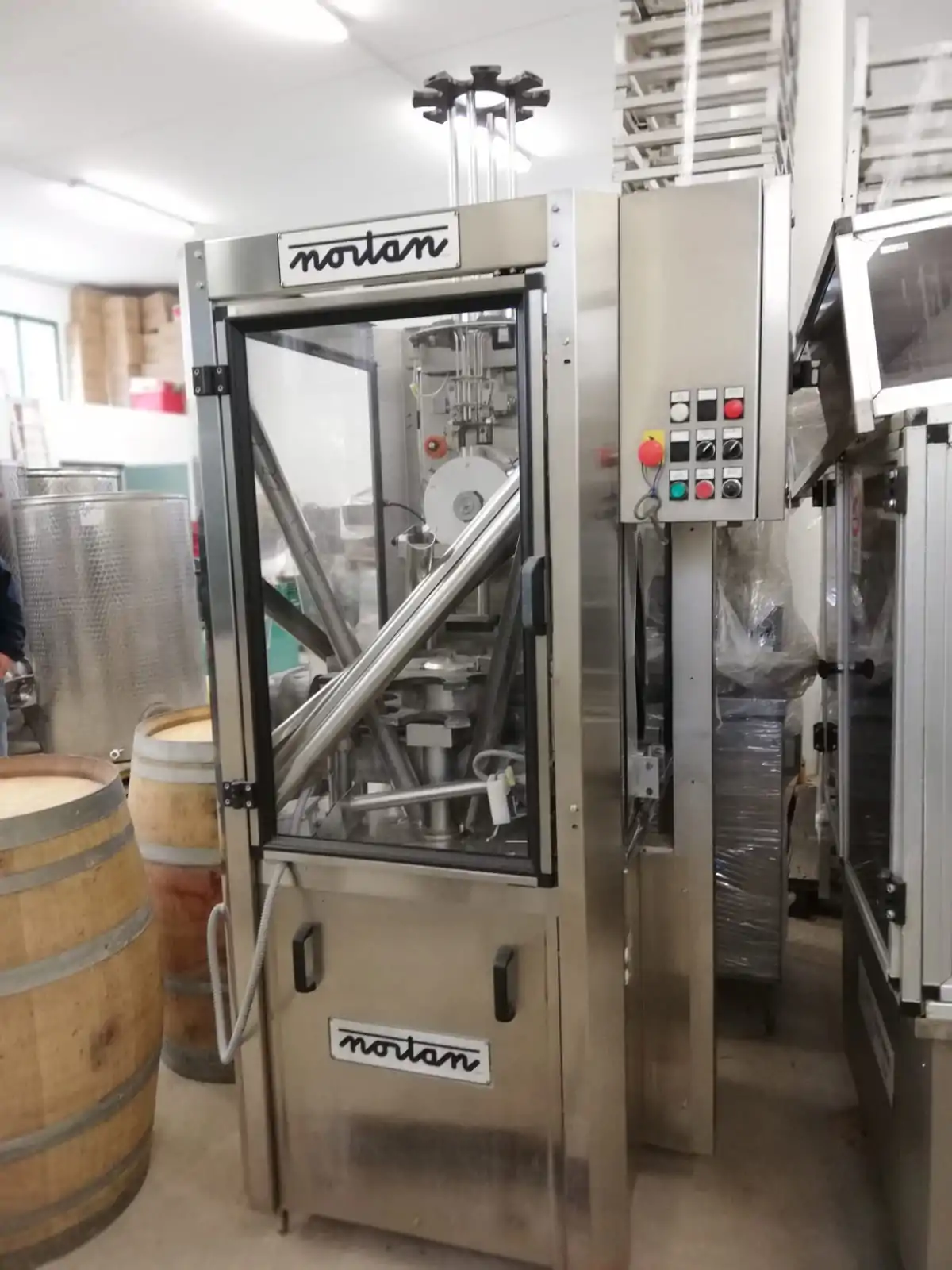 Used Bottling Wirehooder Nortan Minerva 108. - 2003, 3,000 BPH