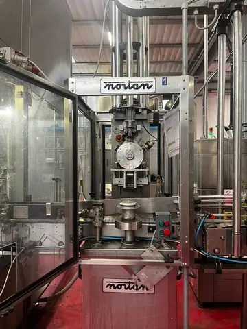 Used Bottling Wirehooder Nortan Minerva 108 - 2000, 3,000 BPH