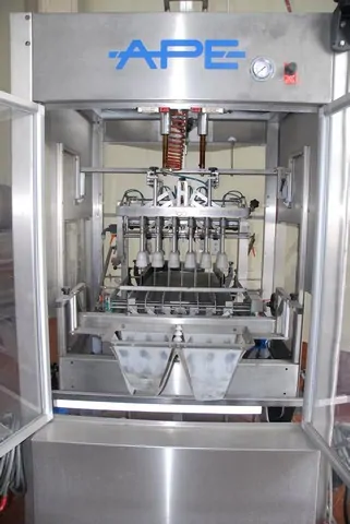 Used Bottling Case Packer APE inca 1200 - 2003, 3,600 BPH
