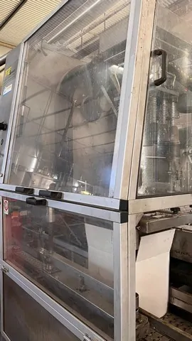 Used Bottling Case Packer TMG - 1991, 2,500 BPH | Stock JM 94