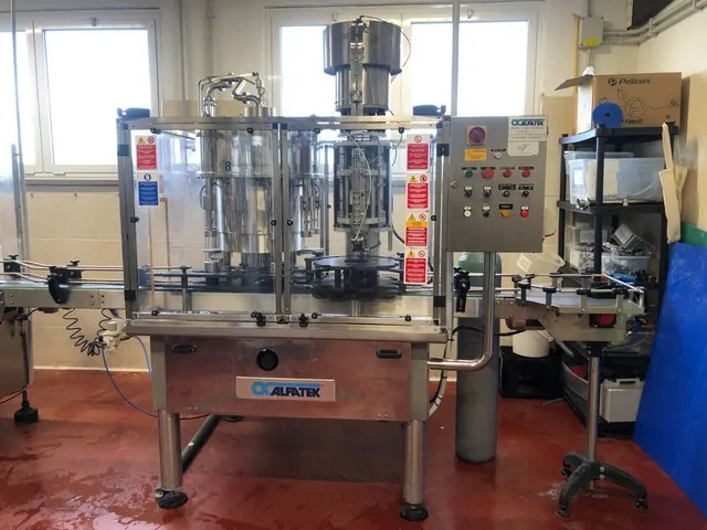 Used Bottling High Vacuum Filling Monoblock Alfatek - 1995, 3,000 BPH