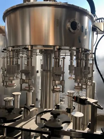 Used Bottling High Vacuum Filling Monoblock Bertolaso MINIBLOCK 12.12.1 - 2001, 2,800 BPH