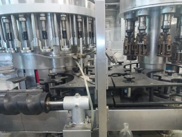 Used Bottling High Vacuum Filling Monoblock Ocim - 1997, 4,000 BPH