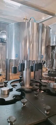 Used Bottling High Vacuum Filling Monoblock Alfatek tbs - 2004, 5,200 BPH