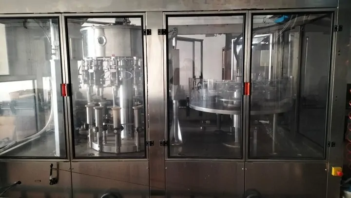 Used Bottling High Vacuum Filling Monoblock Bertolaso Minibloc 12/12/1 - 2006, 2,500 BPH