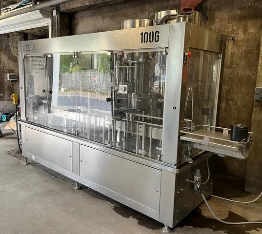 Used Bottling Low Vacuum Filling Monoblock GAI 10006W-002 - 2015, 1,200 BPH