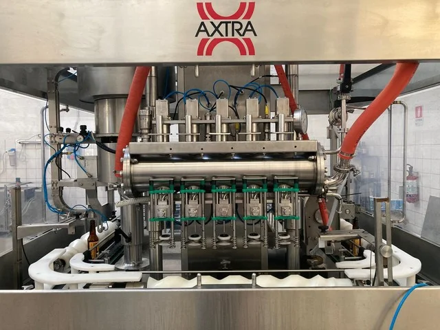 Used Bottling Isobaric Filling Monoblock Axtra Miniline L-SA1 / L-G5 / L-IV5 / L-CW1 bottling machine - 2016, 600 BPH