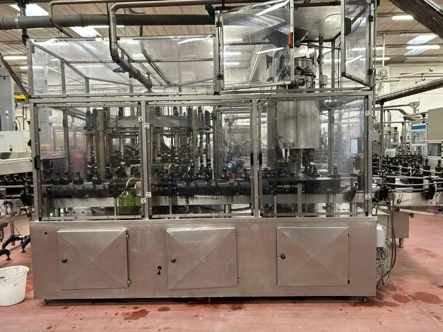 Used Bottling Volumetric Filling Monoblock Cometa 24/6 - 8,000 BPH